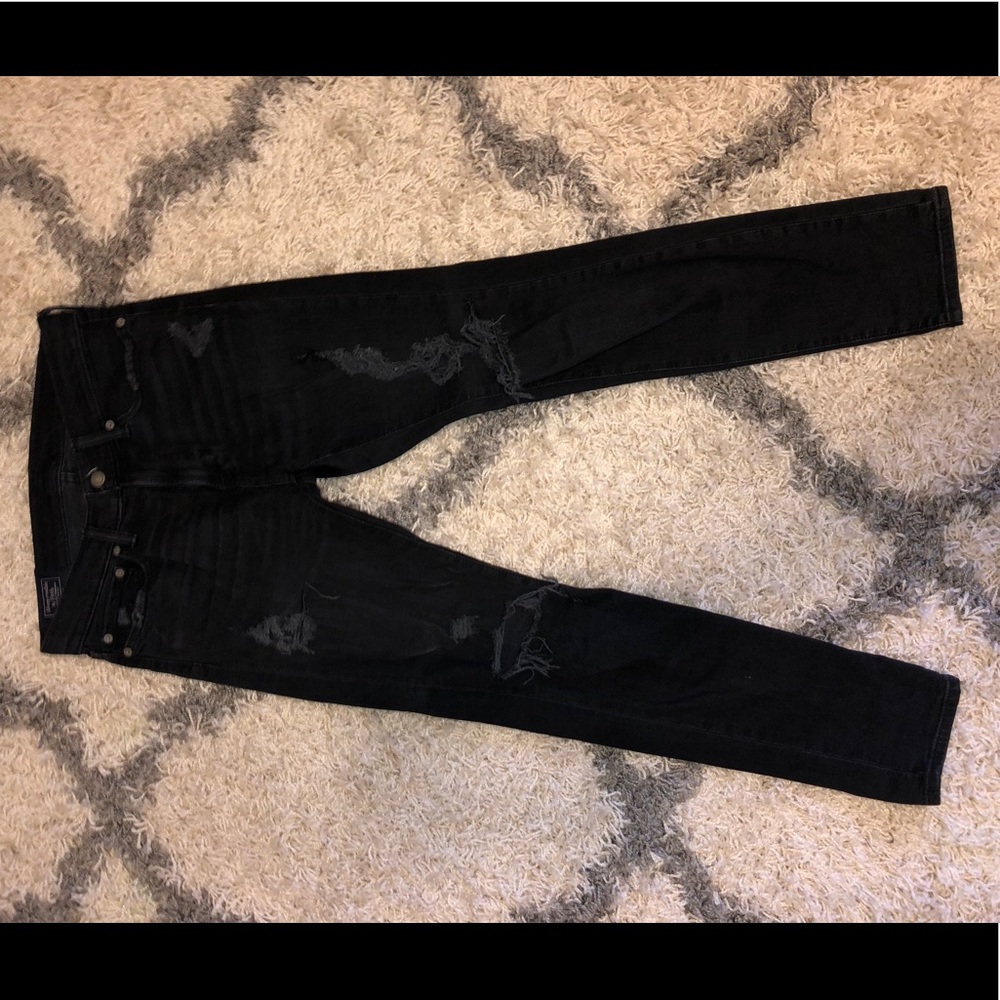 Men’s distressed black skinny jeans